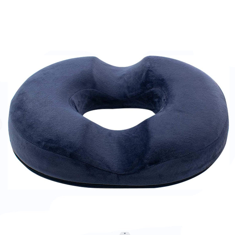 Vista superior del cojín donut con diseño ergonómico.